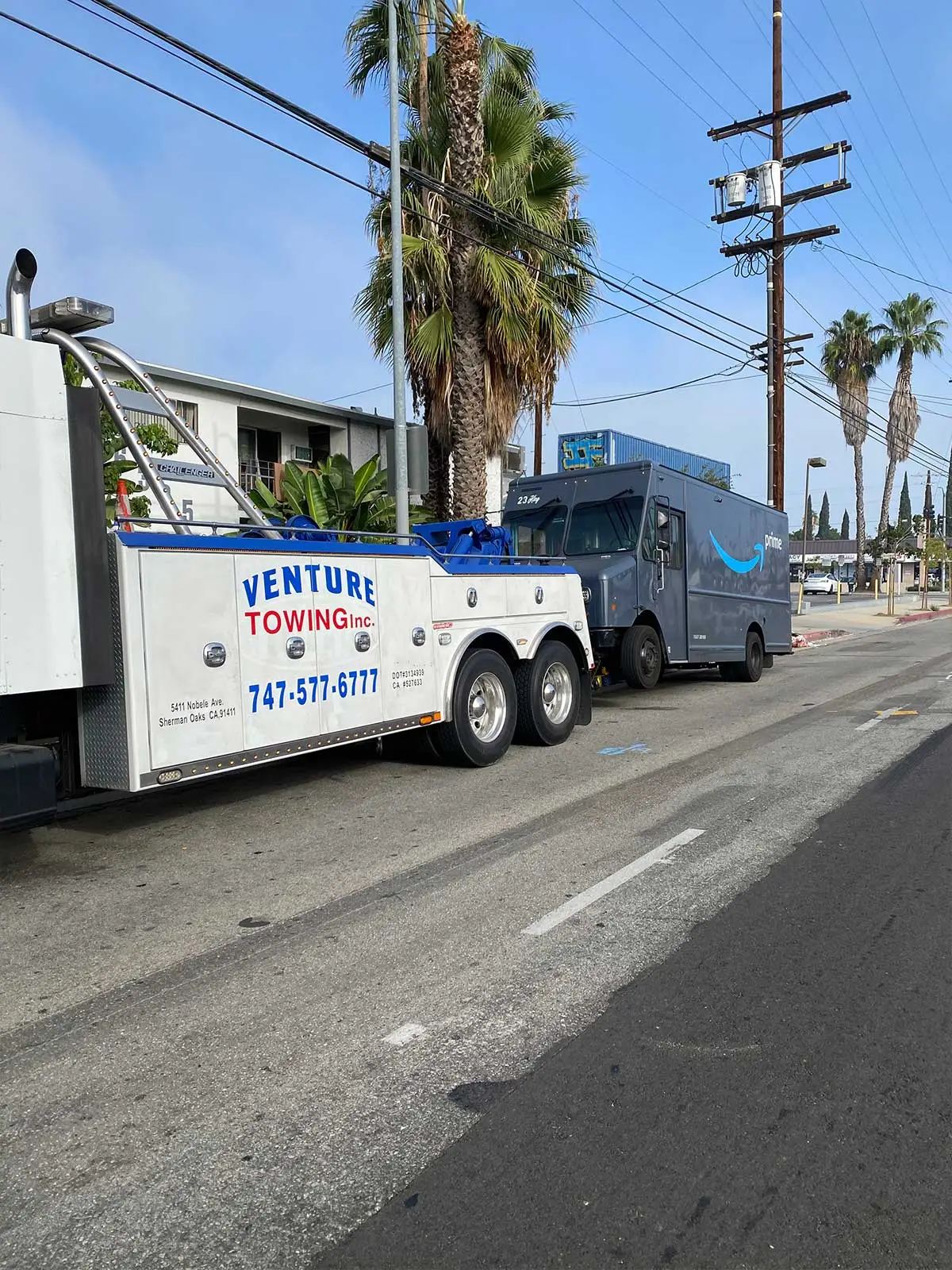 Venture Towing medium duty tow truck on a Los Angeles street